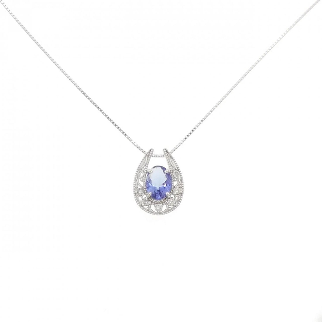 K18WG TANZANITE NECKLACE: K18WG Tanzanite Necklace Brand: Unbranded Type: Necklace Material: K18 White Gold, Main Stone/Creation TanzaniteSide Stone Natural Color: White Gold Size: 45cmActualSizePendant top H x W: