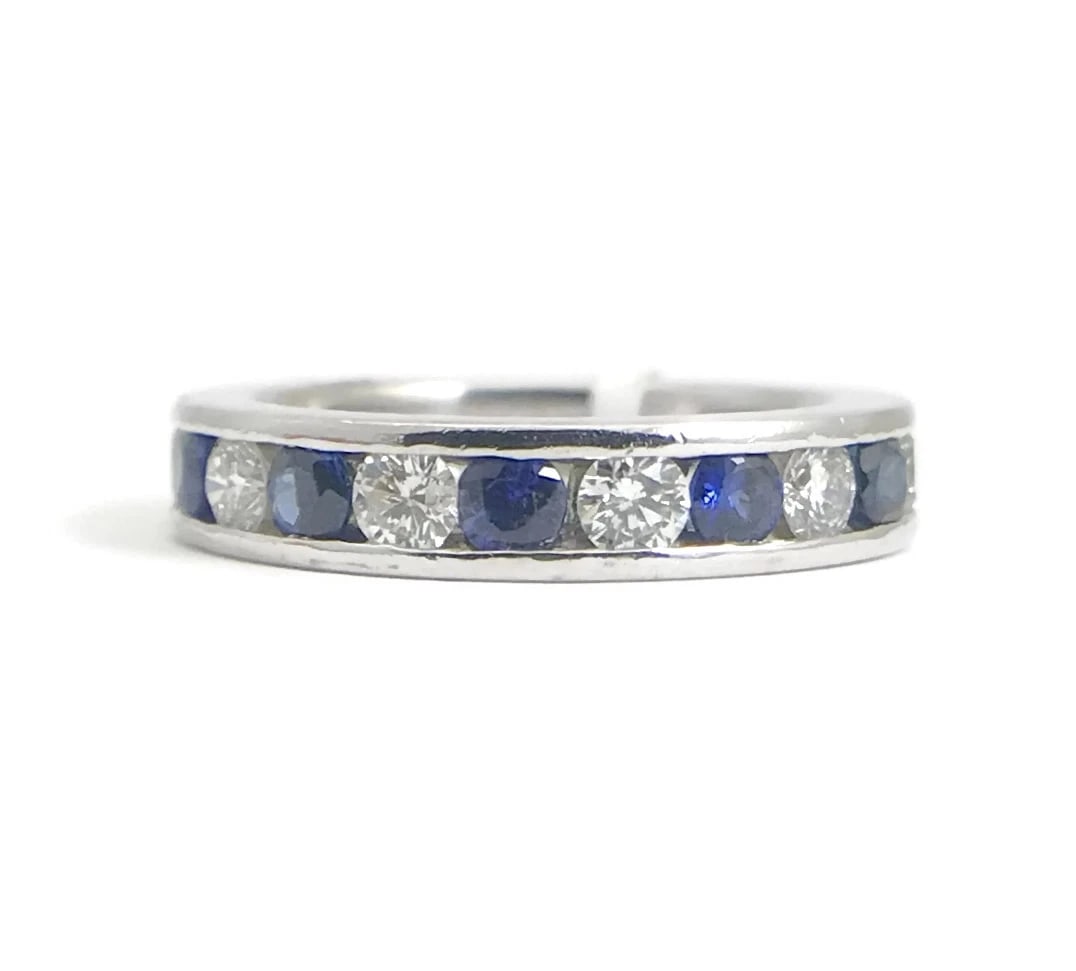 BLUE SAPPHIRE DIAMOND CHANNEL-SET ETERNITY RING: Blue Sapphire Diamond Channel-Set Eternity Ring Brand: Unbranded Type: Eternity Material: platinum, Main Stone/Creation Natural Color: Blue Size: 5.5 US Accessories: None Accessories Notice: