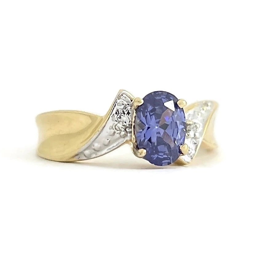 BLUE TANZANITE DIAMOND STATEMENT RING: Blue Tanzanite Diamond Statement Ring Brand: Estate Type: Ring Material: 14K yellow gold, Main Stone/Creation Natural Color: Blue Size: 6 US Accessories: None Accessories Notice: When purc
