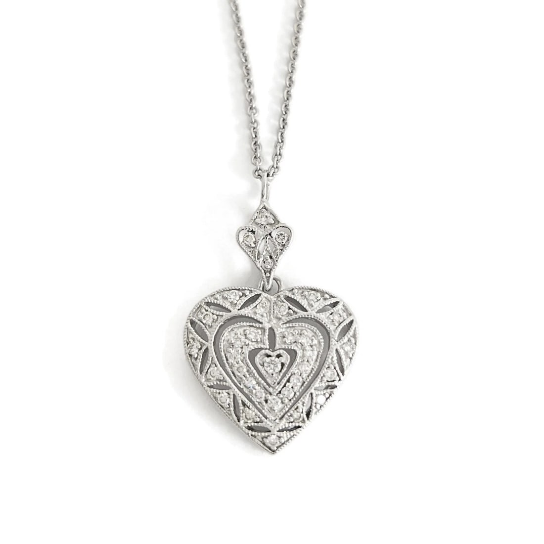 PAVE DIAMOND FILIGREE HEART PENDANT NECKLACE: Pave Diamond Filigree Heart Pendant Necklace Brand: Unbranded Type: Necklace Material: 14K White Gold, Main Stone/Creation Natural Color: Silver Size: Length: 18 inches Pendant: 1.1 inch (with