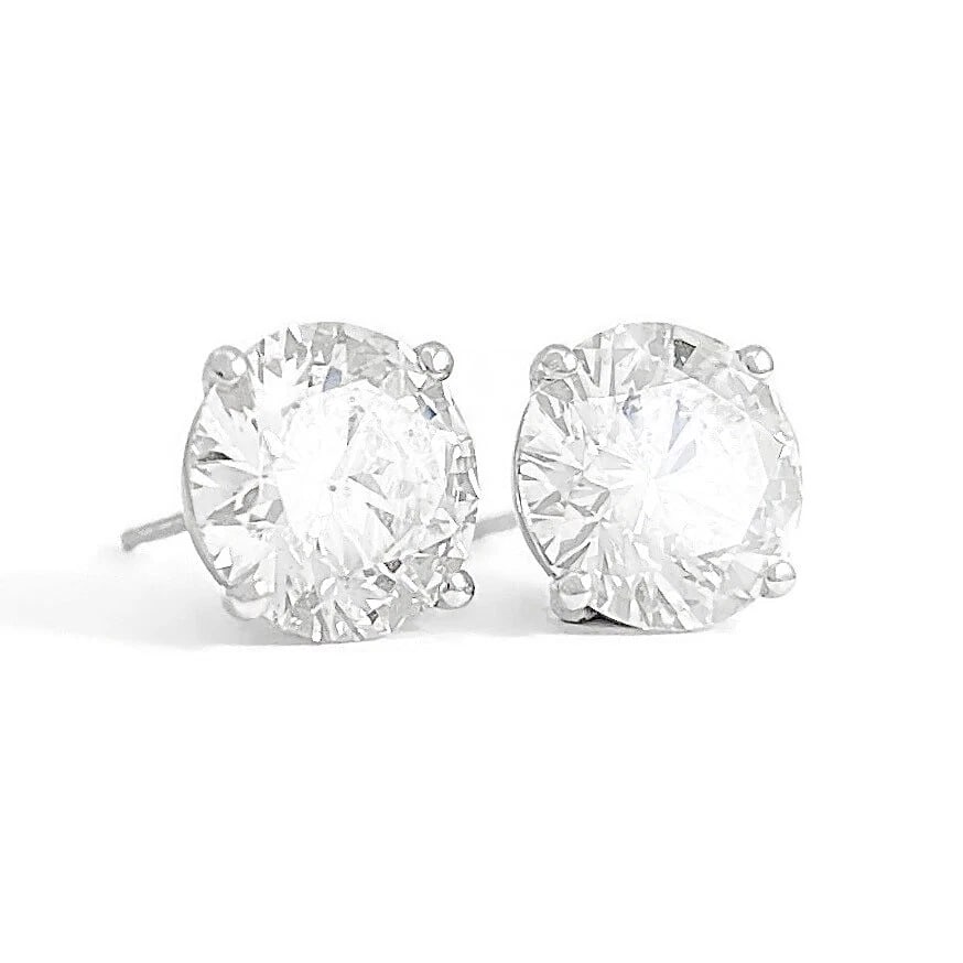 ROUND DIAMOND STUD EARRINGS 14K WHITE GOLD: Round Diamond Stud Earrings 14K White Gold Brand: Unbranded Type: Earrings Material: 14K White Gold, Main Stone/Creation Natural Color: White Size: Measurements: 9.45 mm - 9.5 mm Accessories: