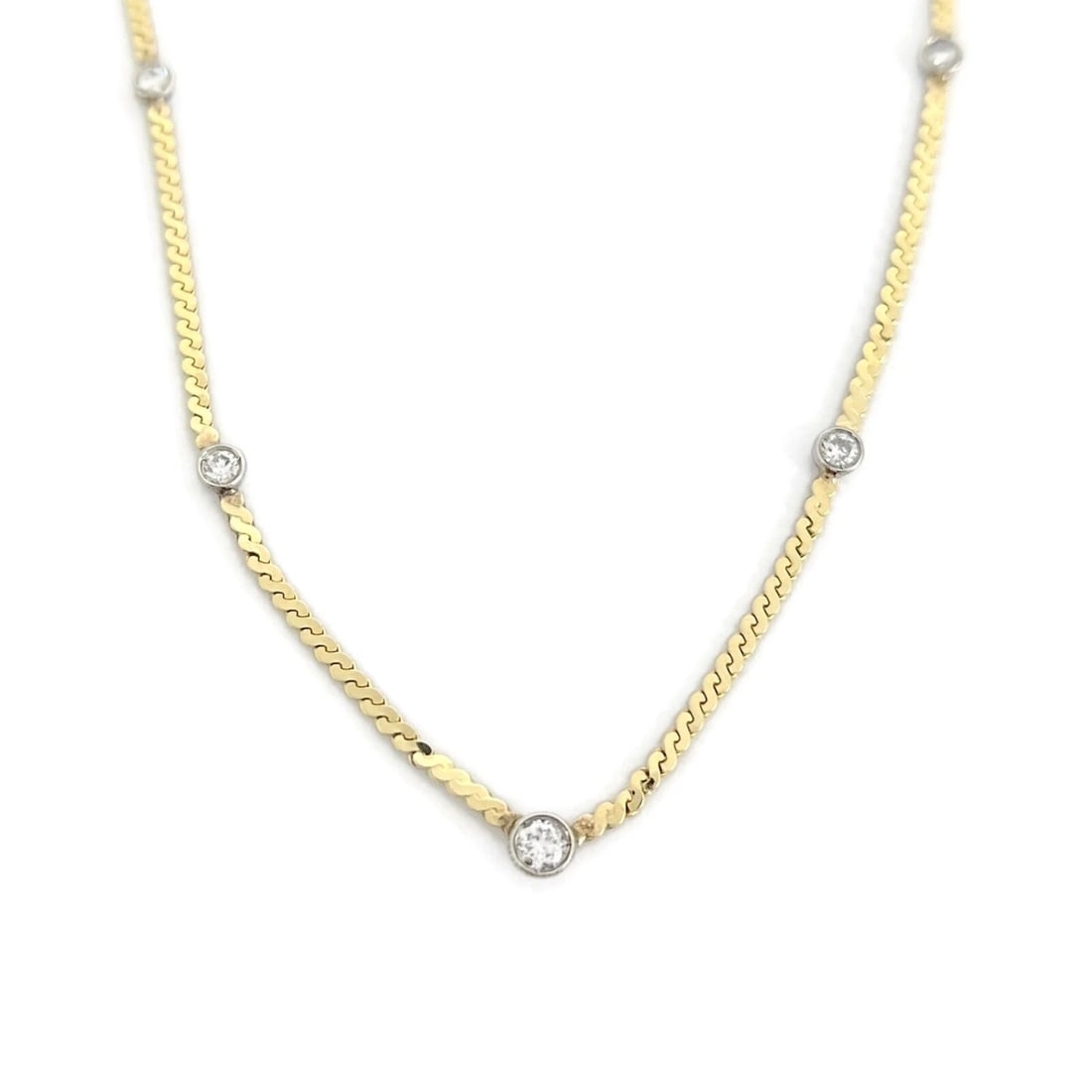 ITALIAN ROUND TWO-TONE DIAMOND BEZEL STATION NECKLACE: Italian Round Two-Tone Diamond Bezel Station Necklace Brand: Unbranded Type: Necklace Material: 14K Yellow Gold, Main Stone/Creation Natural Color: Gold Size: Length: 16 inches Accessories: