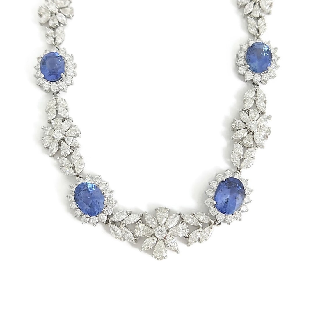 SAPPHIRE DIAMOND FLOWER HALO GEMSTONE FANCY NECKLACE: Sapphire Diamond Flower Halo Gemstone Fancy Necklace Brand: Unbranded Type: Necklace Material: Pt900, Main Stone/Creation Natural Color: Blue Size: Length: 16 inches Width: 15.6 mm - 5.5 mm 
