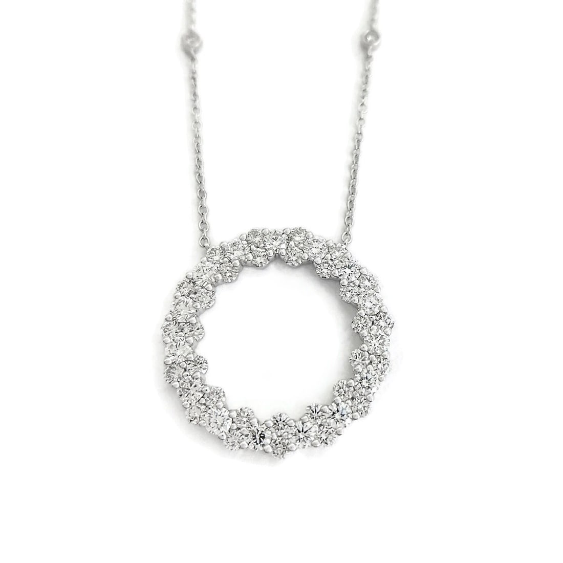 CLUSTER DIAMOND CIRCLE OF LIFE PENDANT STATION NECKLACE: Cluster Diamond Circle of Life Pendant Station Necklace Brand: Unbranded Type: Necklace Material: 14K White Gold, Main Stone/Creation Natural Color: Silver Size: Length: 16 inches Pendant: 1
