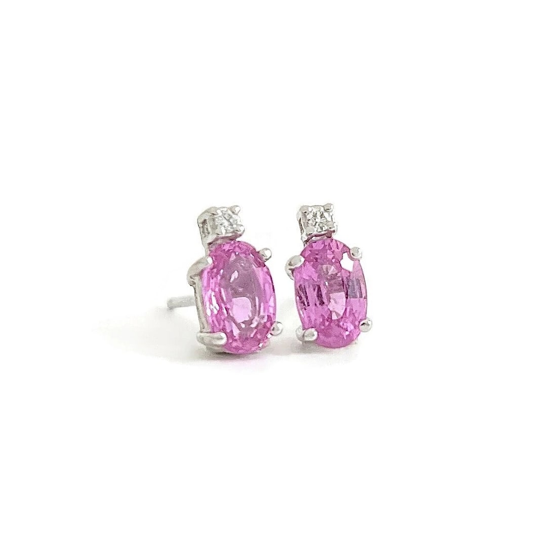 OVAL PINK SAPPHIRE DIAMOND GEMSTONE STUD EARRINGS: Oval Pink Sapphire Diamond Gemstone Stud Earrings Brand: Unbranded Type: Earrings Material: 14K White Gold, Main Stone/Creation Natural Color: Pink Size: Length: 8 mm Width: 4.4 mm 