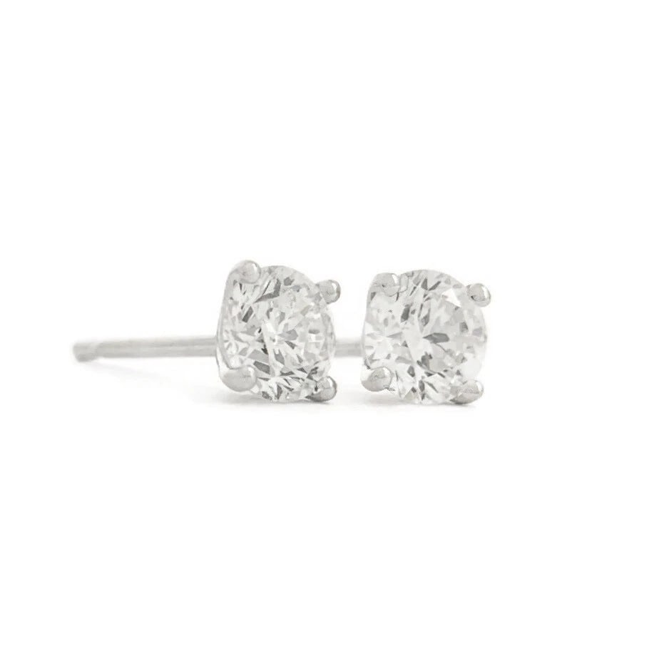 ROUND DIAMOND STUD EARRINGS 14K WHITE GOLD: Round Diamond Stud Earrings 14K White Gold Brand: Unbranded Type: Earrings Material: 14K White Gold, Main Stone/Creation Natural Color: White Size: Measurements: 4.2 mm Accessories: None A