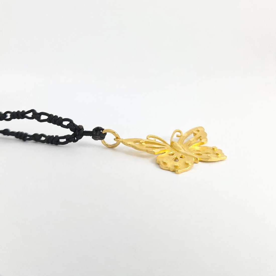 BUTTERFLY PENDANT LONG BLACK CORD NECKLACE 24K YELLOW GOLD: Butterfly Pendant Long Black Cord Necklace 24K Yellow Gold Brand: Estate Type: Necklace Material: 24K Yellow Gold, Color: Gold Size: Length: 28 inches Pendant: 1.5 inches (with bale) x 20.5 mm
