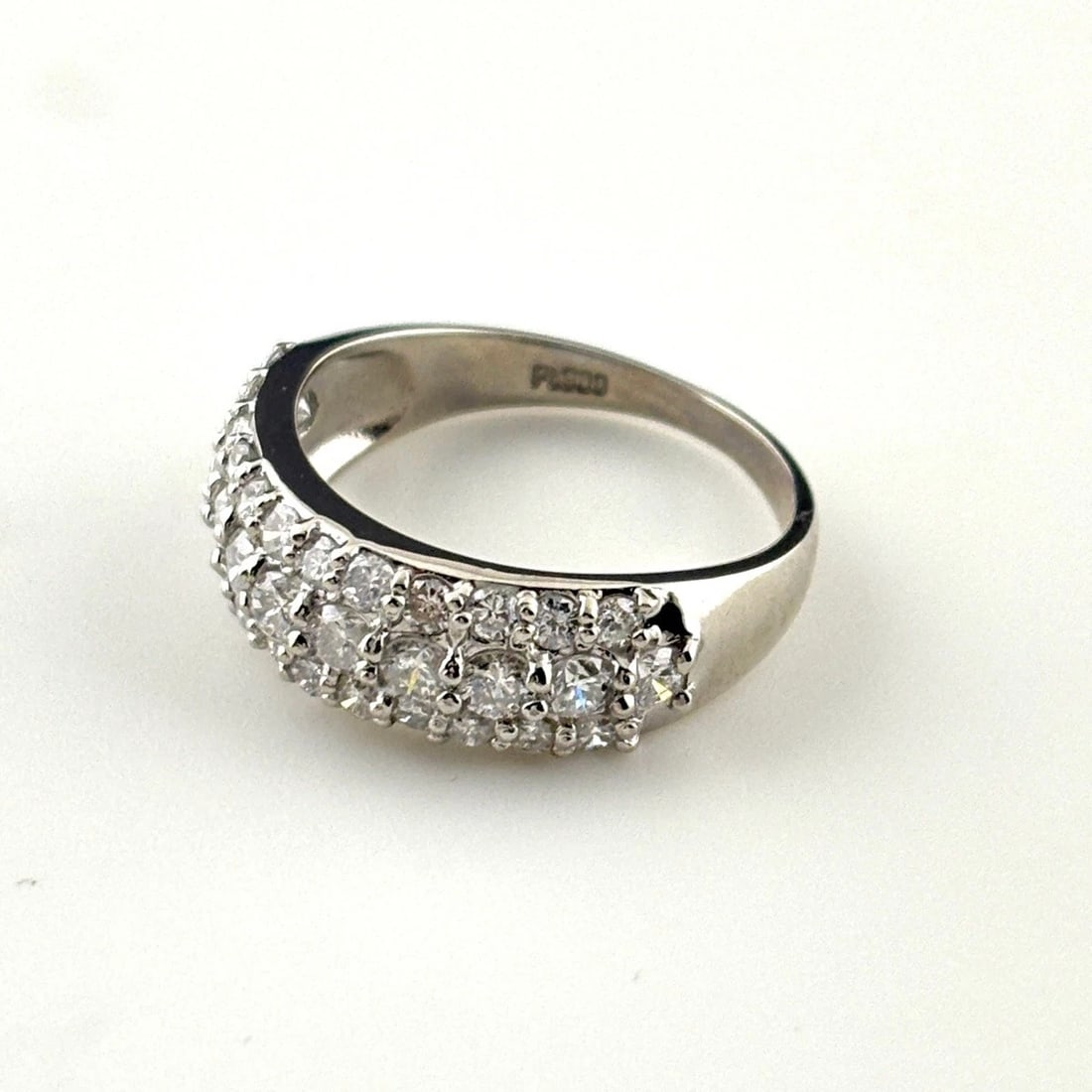 MELEE DIAMOND DESIGN RING PLATINUM: Melee diamond design Ring Platinum Brand: Unbranded Type: Ring Material: Pt900, Main Stone/Creation Natural Color: Platinum Size: US 5 Accessories: None Accessories Notice: When purchasing