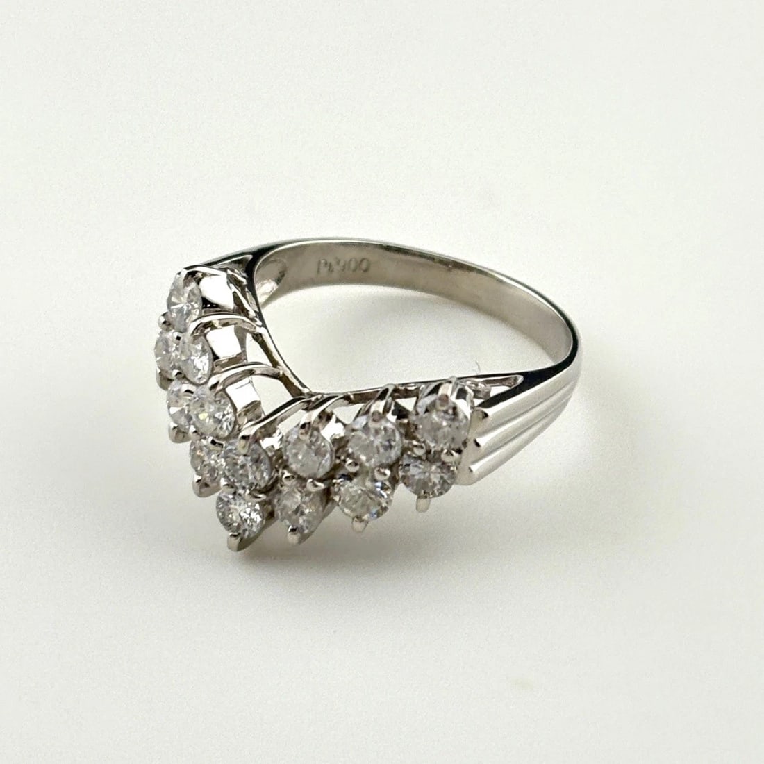 MELEE DIAMOND DESIGN RING PLATINUM: Melee diamond design Ring Platinum Brand: Unbranded Type: Ring Material: Pt900, Color: Platinum Size: US 6.5 to 7 Accessories: None Accessories Notice: When purchasing pre-owned goods, please