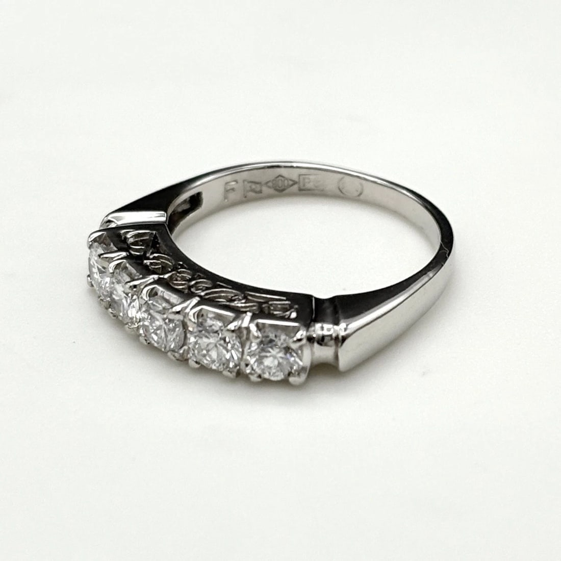 MELEE DIAMOND DESIGN RING PLATINUM RING: Melee diamond design Ring Platinum Ring Brand: Unbranded Type: Ring Material: Pt900, Color: Platinum Size: US 4 to 4.5 Accessories: None Accessories Notice: When purchasing pre-owned goods