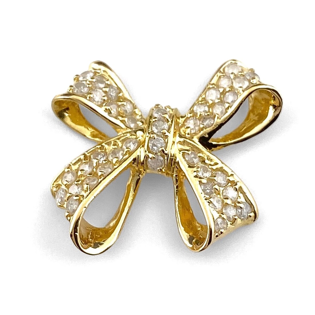 RIBBON MOTIF PENDANT HEAD YG YELLOWGOLD: Ribbon motif Pendant Head YG YellowGold Brand: Unbranded Type: Pendant Head Material: 18K, Color: Yellow Gold Size: Pendant size 18.5×21.5mm(0.7") Inside diameter of the bail 5.1×1.8mm(0.2") Ac