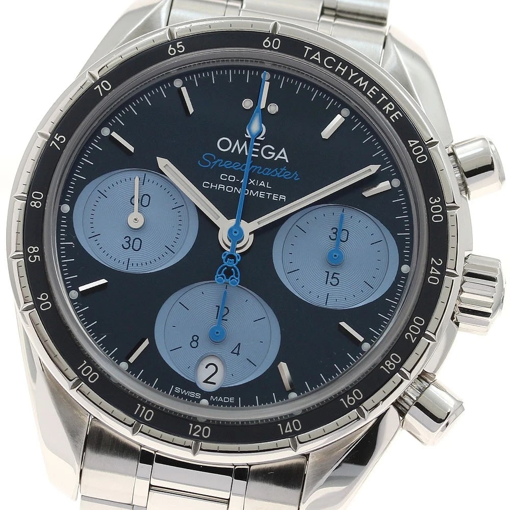 OMEGA SPEEDMASTER CO AXIAL WATCH: OMEGA Speedmaster Co Axial Watch Brand: OMEGA Type: Wristwatch Material: Band Material Stainless Steel, Case Material Stainless Steel Color: Band Color Silver, Dial Color Navy/Ice Blue, Case