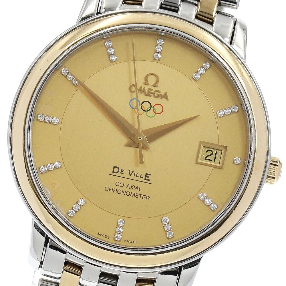 OMEGA DE VILLE OLYMPIC WATCH: OMEGA De Ville Olympic Watch Brand: OMEGA Type: Wristwatch Material: Band Material Stainless Steel/YG, Case Material Stainless Steel/YG Color: Band Color Silver / Gold, Dial Color gold, Case