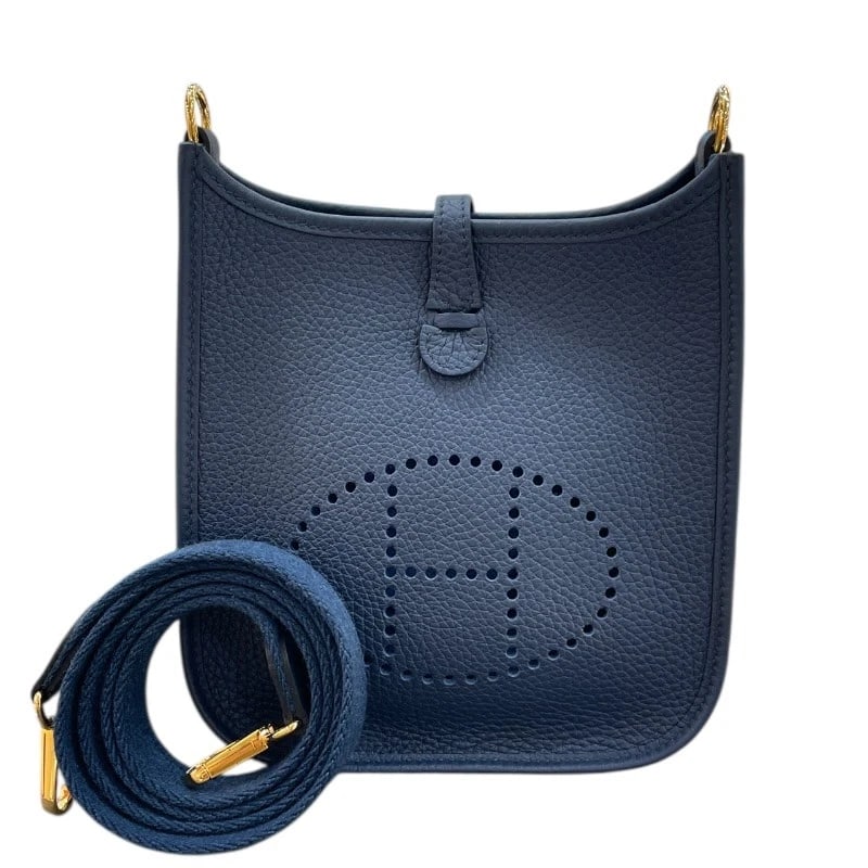 HERMES EVELYN TPM SHOULDER BAG: HERMES Evelyn TPM Shoulder Bag Brand: HERMES Type: Shoulder Bag Material: Taurillon Clemence Color: Gold Hardware Size: W6.7 x H7.5x D2.2inch Shoulder:43.7inch Accessories: None Accessorie