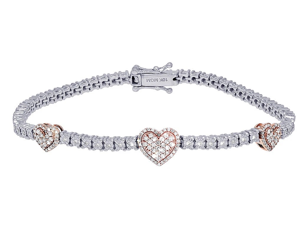 THREE HEARTS REAL DIAMOND ILLUSION SET TENNIS BRACELET: Three Hearts Real Diamond Illusion set Tennis Bracelet Brand: None Type: Bracelet Material: 10k White-Rose Gol Main Stone/Creation Natural Color: Rose-White Gold Size: Dimension L 7" , Tennis 3mm