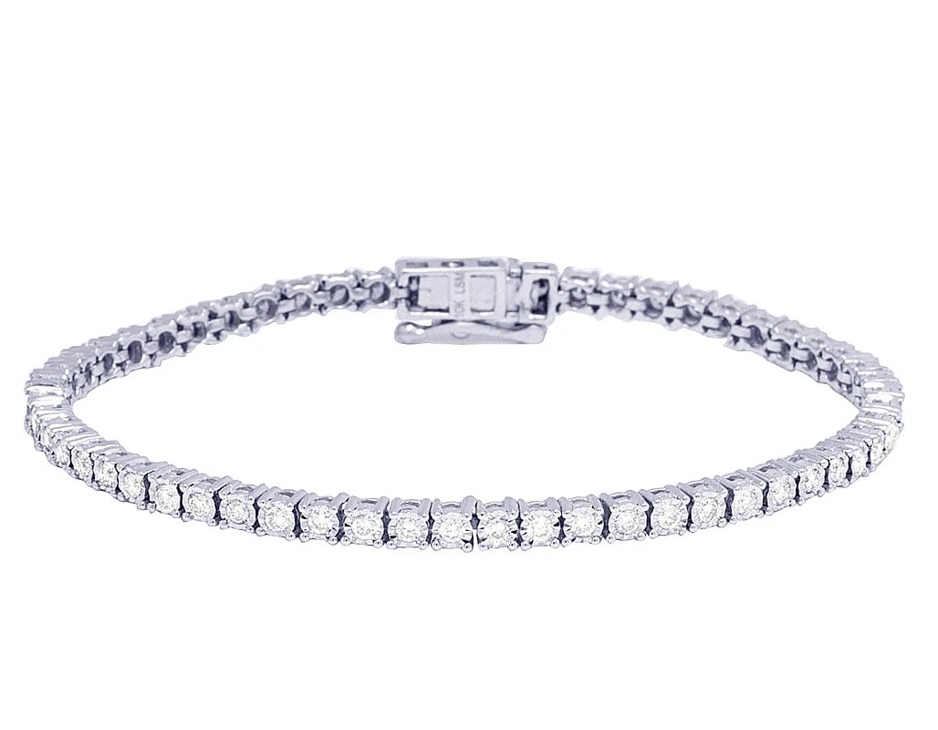 SOLO ROW REAL DIAMOND TENNIS BRACELET: Solo Row Real Diamond Tennis Bracelet Brand: None Type: Bracelet Material: 10k White Gold Main Stone/Creation Natural Color: White Gold Size: Dimension W 3.5MM , L 8" Accessories: None