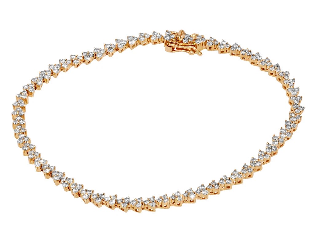TRIO REAL DIAMOND TENNIS BRACELET 14K YELLOW GOLD: Trio Real Diamond Tennis Bracelet 14K Yellow Gold Brand: None Type: Bracelet Material: 10k Yellow Gold Main Stone/Creation Natural Color: Yellow Gold Size: Dimension L 7.5" x W 6.5mm Accessories: