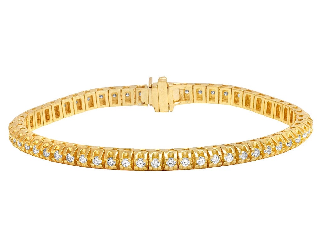 DIAMOND ONE ROW PYRAMID BRACELET 10K YELLOW GOLD: Diamond One Row Pyramid Bracelet 10K Yellow Gold Brand: None Type: Bracelet Material: 10k Yellow Gold Color: Yellow Gold Size: Dimension 8", 5.5mm Accessories: None Accessories Notice: Whe
