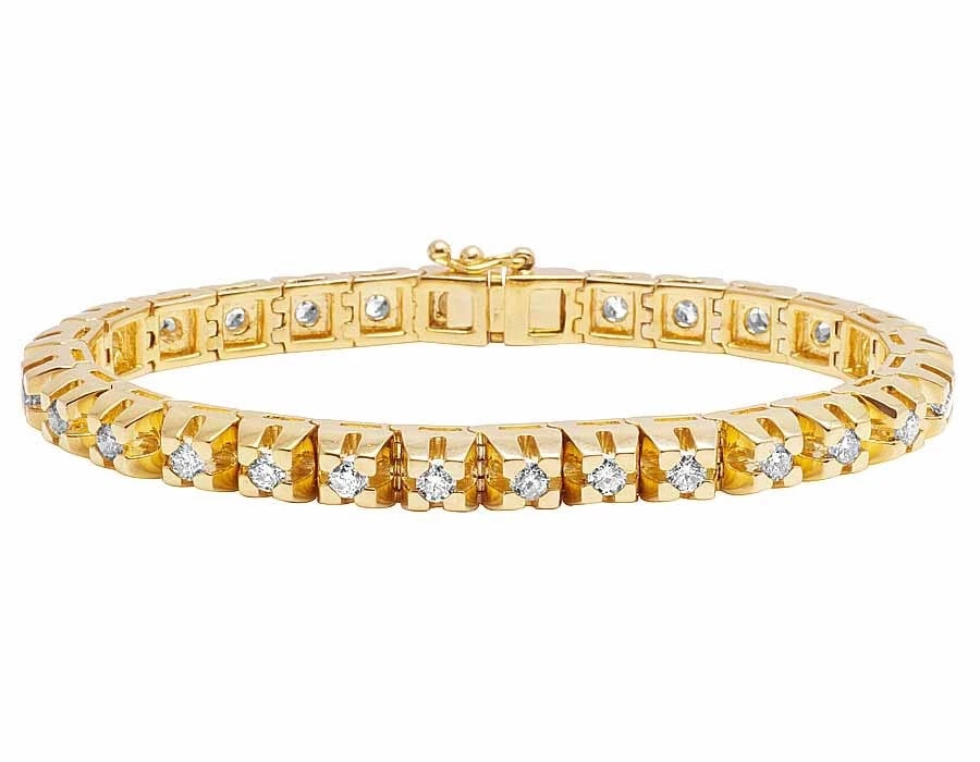 SOLID 10K YELLOW GOLD RAISED PRONG ONE ROW TENNIS DIAMOND BRACELET: Solid 10K Yellow Gold Raised Prong One Row Tennis Diamond Bracelet Brand: None Type: Bracelet Material: 10k Yellow Gold Main Stone/Creation Natural Color: Yellow Gold Size: Dimension 8" 7mm Acces