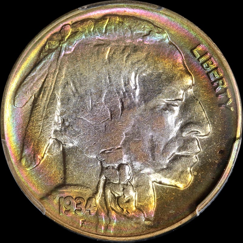 1934-D BUFFALO NICKEL SILLY RAINBOW TONING: 1934-D Buffalo Nickel Silly Rainbow Toning Year: 1934 Fineness: None Composition: None Denomination: None Country of Origin: United States Accessories: None Accessories Notice: When