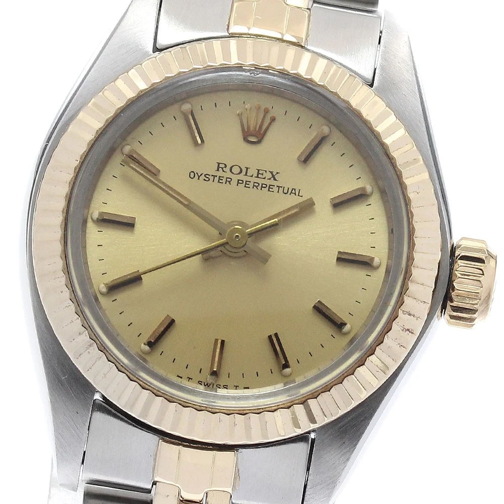 ROLEX OYSTER PERPETUAL YG BEZEL GOLD WATCH: ROLEX Oyster perpetual YG bezel gold Watch Brand: ROLEX Type: Wristwatch Material: Band Material Stainless Steel/YG, Case Material Stainless Steel/YG Color: Band Color Gold / Silver, Dial Color