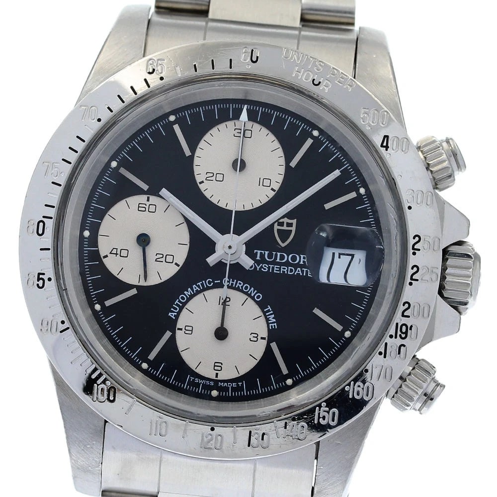TUDOR OYSTER CHRONO BLACK WATCH: TUDOR Oyster Chrono Black Watch Brand: TUDOR Type: Wristwatch Material: Band Material Stainless Steel, Case Material Stainless Steel Color: Band Color Silver, Dial Color Black / Silver, Case