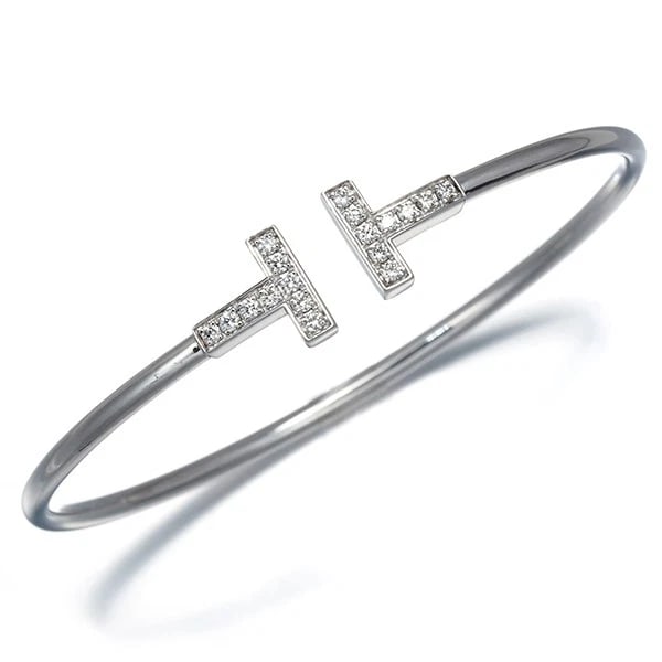 TIFFANY&CO. BRACELET DIAMOND TIFFANY T WIRE BANGLE: Tiffany&Co. Bracelet Diamond Tiffany T Wire Bangle Brand: Tiffany & Co. Type: Bracelet Material: 18K / 750 / White Gold Main Stone/Creation Natural Color: White Gold Size: Inner circumference: