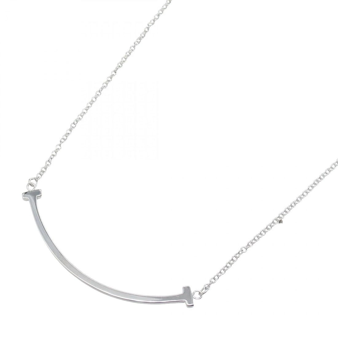 TIFFANY?CO T SMILE SMALL NECKLACE 18KWG: TIFFANY?CO T Smile Small Necklace 18KWG Brand: TIFFANY?CO Type: Necklace Material: K18WG?White Gold? Color: White Gold Size: Size Neck rotation?40/45cm(15.7") Motif W?37mm x H?3mm(1.5" x 0.1")