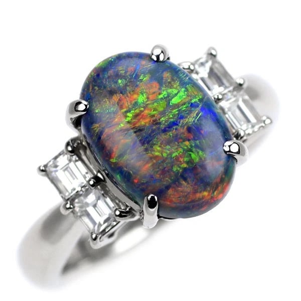 PT900 BLACK OPAL DIAMOND RING: Pt900 black opal diamond ring Brand: None Type: Ring Material: Metal Purity None Metal Pt900 Main Stone/Creation Opal Color: None Size: 5.5 - 5.75 US Accessories: None Accessories Notice: