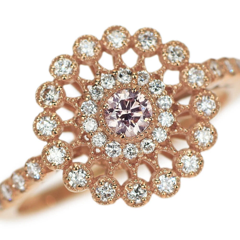 K18PG NATURAL PINK DIAMOND RING: K18PG Natural Pink Diamond Ring Brand: None Type: Ring Material: Metal Purity None Metal K18PG Main Stone/Creation Natural Color: None Size: 6 US Accessories: None Accessories Notice: When