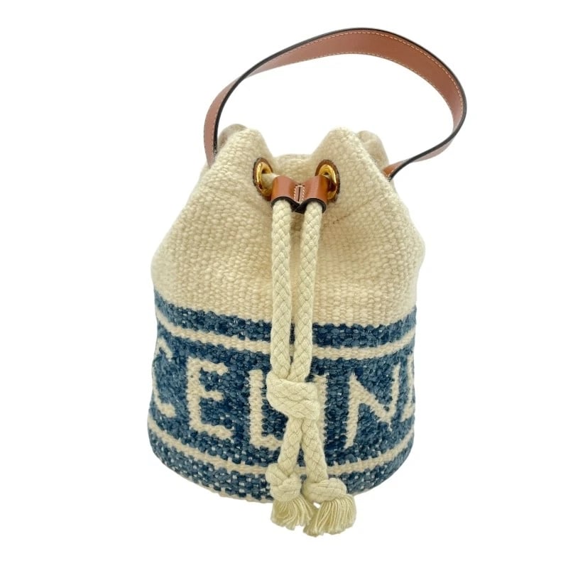 CELINE TEEN DRAWSTRING BAG HANDBAG: CELINE Teen Drawstring Bag Handbag Brand: CELINE Type: Handbag Material: cotton Color: Ivory Size: W6.3 x H7.1x D6.3inch Accessories: None Accessories Notice: When purchasing pre-owned goods,