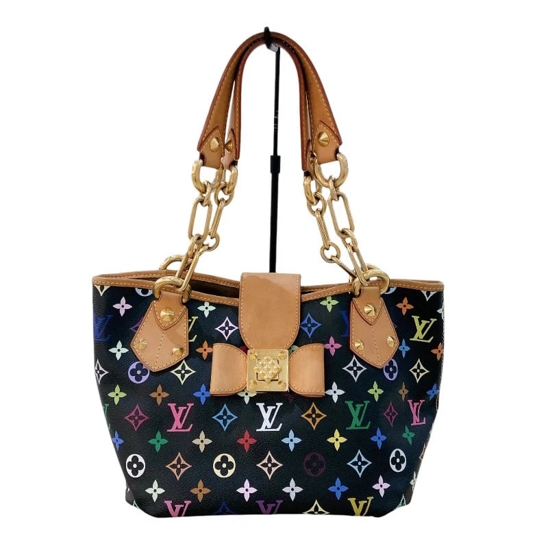 LOUIS VUITTON ANNIE GM HANDBAG: LOUIS VUITTON Annie GM Handbag Brand: LOUIS VUITTON Type: Handbag Material: Monogram multicolor Color: Noir Size: W9.8 x H7.5x D6.7inch Accessories: None Accessories Notice: When purchasing