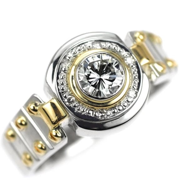 PT900/K18YG DIAMOND RING: PT900/k18yg diamond ring Brand: None Type: Ring Material: Metal Purity 900 Metal Platinum Main Stone/Creation Natural Color: None Size: 6.75 - 7 US Accessories: None Accessories Notice: When