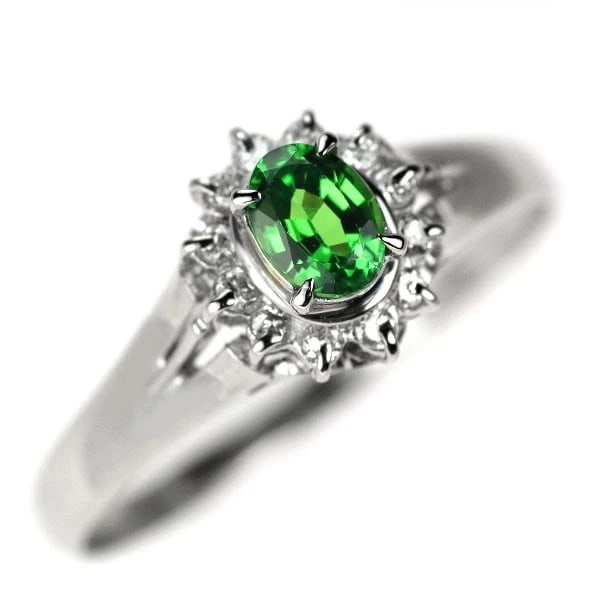 PT900 GROSSULARITE GARNET DIAMOND RING: Pt900 Grossularite Garnet Diamond Ring Brand: None Type: Ring Material: Metal Purity 900 Metal Platinum Main Stone/Creation garnet Color: None Size: 9 US Accessories: None Accessories Notice: