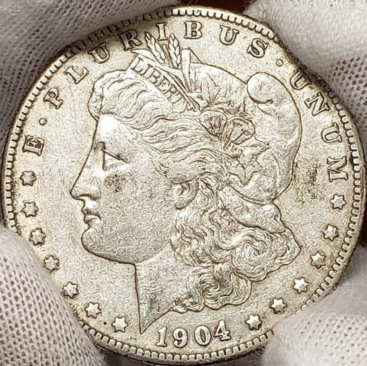 1904-S $1 MORGAN SILVER DOLLAR - LUSTER: 1904-S $1 Morgan Silver Dollar - Luster Brand/Mint: None Year: 1904 Fineness: Composition: Silver Coin: Morgan Denomination: $1 Country of Origin: United States Accessories: None