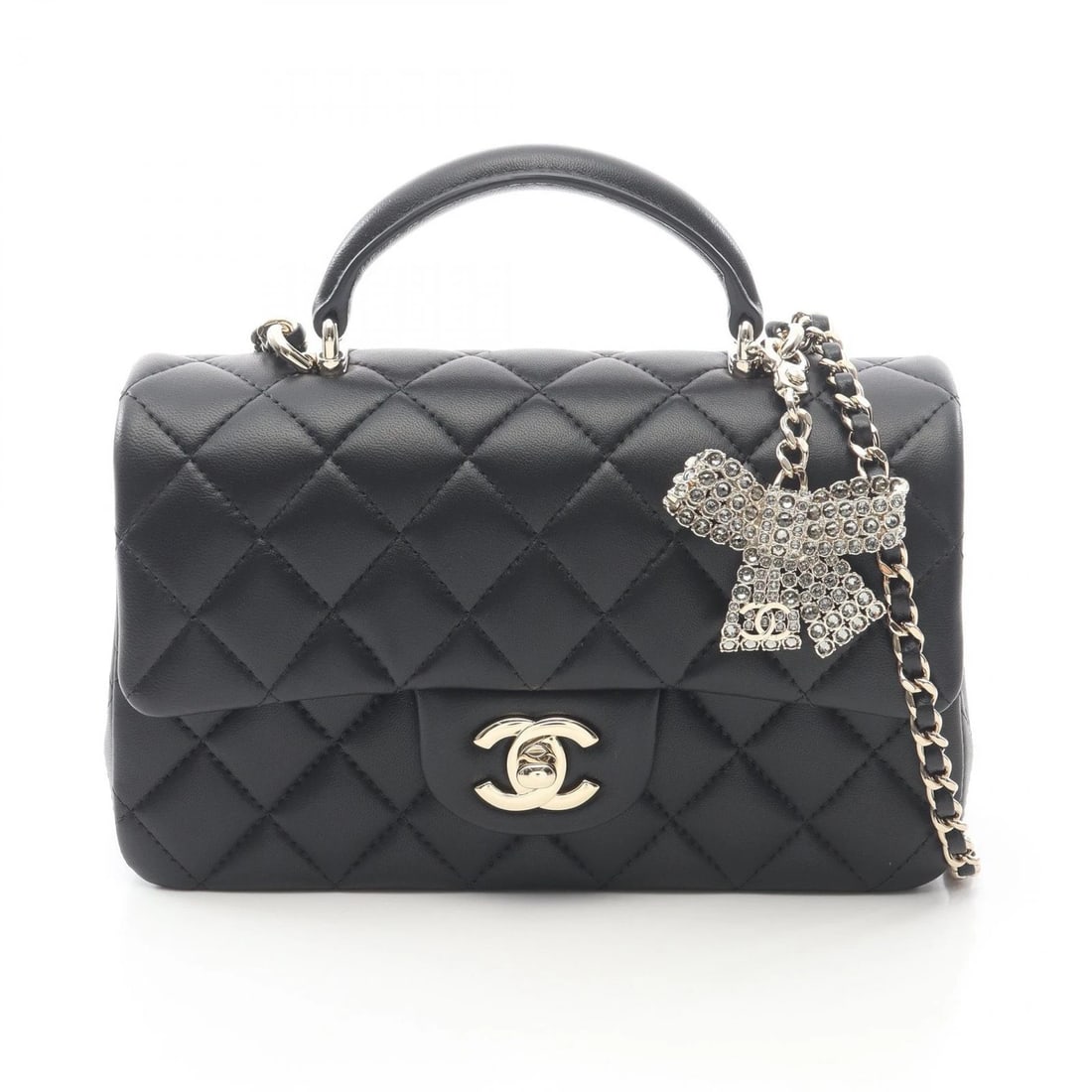 CHANEL TOP HANDLE MINI CLASSIC SHOULDER HANDBAG: CHANEL Top Handle Mini Classic Shoulder Handbag Brand: CHANEL Type: Shoulder Bag Material: Lambskin (sheep leather) Color: Black??ish colors Size: H:12cm x W:20cm x D:6.5cm (H:4.7" x W:7.9" x D:2.