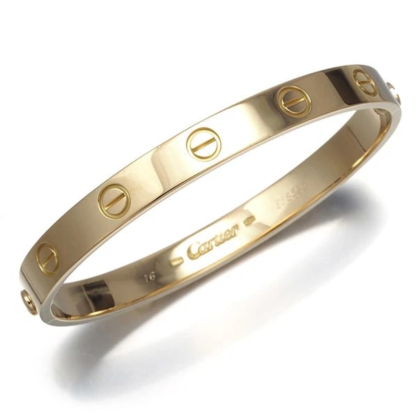 CARTIER BRACELET LOVE CLASSIC 16 ENGRAVED BANGLE: Cartier Bracelet Love Classic 16 Engraved Bangle Brand: Cartier Type: Bracelet Material: 18K / 750 / Yellow Gold Color: Yellow Gold Size: Inner circumference: 15cm Bracelet Width: 6.3mm 