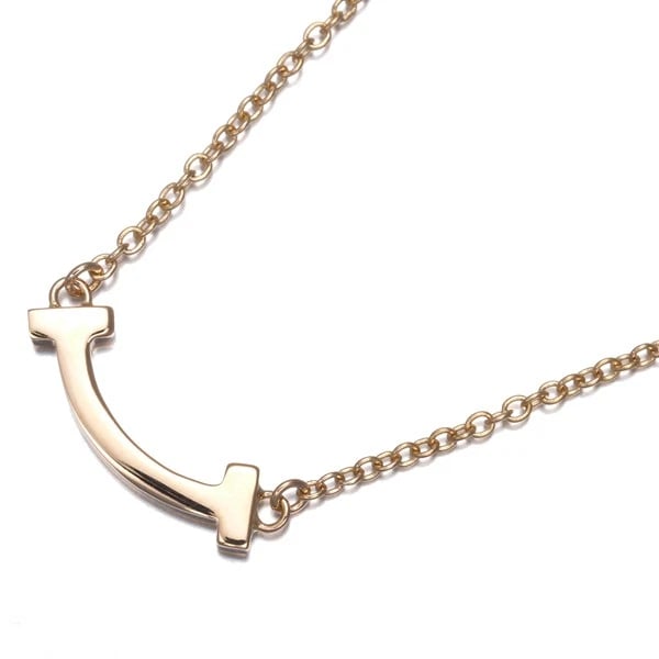 TIFFANY&CO. NECKLACE SMILE MINI 18K 750 ROSE GOLD: Tiffany&Co. Necklace Smile Mini 18K 750 Rose Gold Brand: Tiffany & Co. Type: Necklace Material: 18K / 750 / Rose Gold Color: Gold Size: Necklace length: 40 / 45cm Pendant size: 4.5 x 13.8mm 