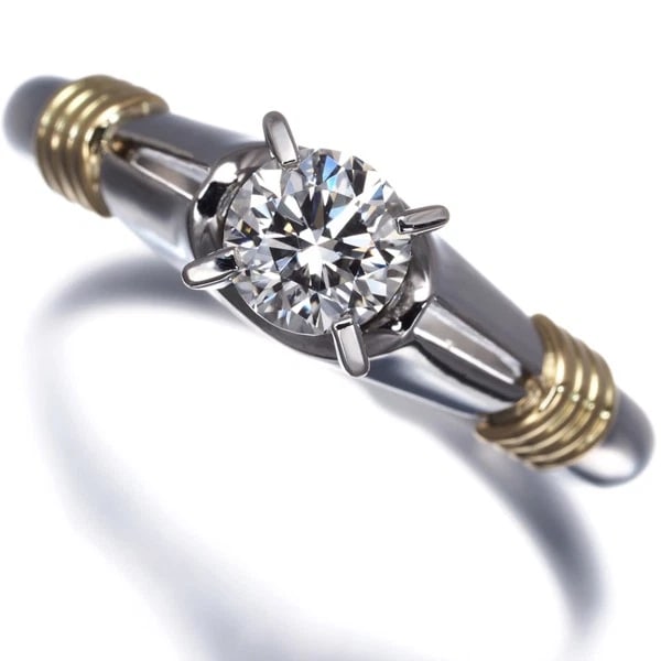 CHRISTIAN DIOR RING DIAMOND SOLITAIRE SOLITAIRE: Christian Dior Ring Diamond Solitaire Solitaire Brand: Christian Dior Type: Ring Material: 900 / Platinum 18K / 750 / Yellow Gold Main Stone/Creation Natural Color: Silver,Yellow Gold Size: US
