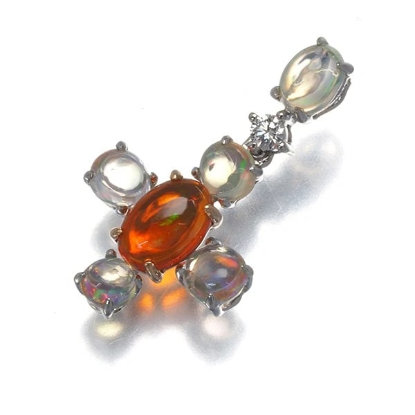 OPAL DIAMOND CROSS DROP PENDANT: Opal Diamond Cross Drop Pendant Brand: Unbranded Type: Pendant Material: 18K / 750 / White Gold Main Stone/Creation Natural Color: White Gold Size: Design size: 22.0 x 12.1mm Bail inner