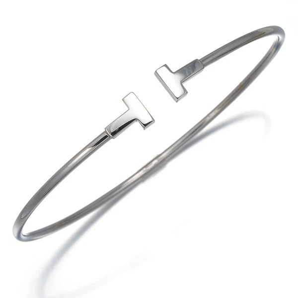 TIFFANY&CO. BRACELET BANGLE 18K 750 WHITE GOLD: Tiffany&Co. Bracelet Bangle 18K 750 White Gold Brand: Tiffany & Co. Type: Bracelet Material: 18K / 750 / White Gold Color: White Gold Size: Inner circumference: 17.5cm Design width: 6.8mm 