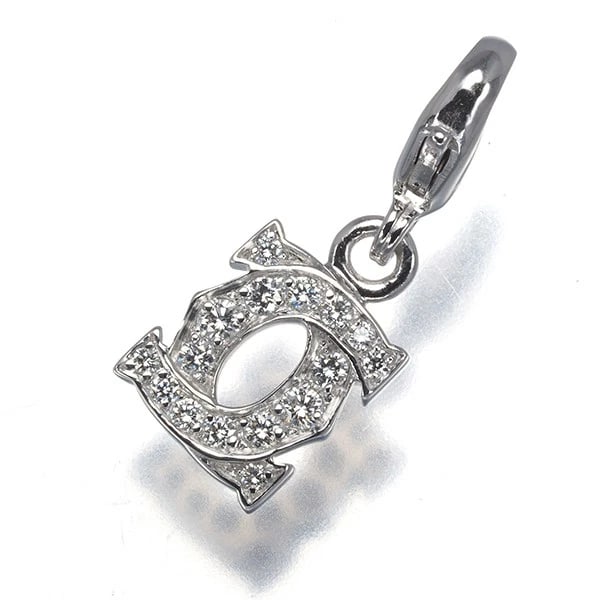 CARTIER PENDANT DIAMOND ENTRELACES BABY CHARM: Cartier Pendant Diamond Entrelaces Baby Charm Brand: Cartier Type: Pendant Material: 18K / 750 / White Gold Main Stone/Creation Natural Color: White Gold Size: Design size: 8.0 x 7.3mm Total