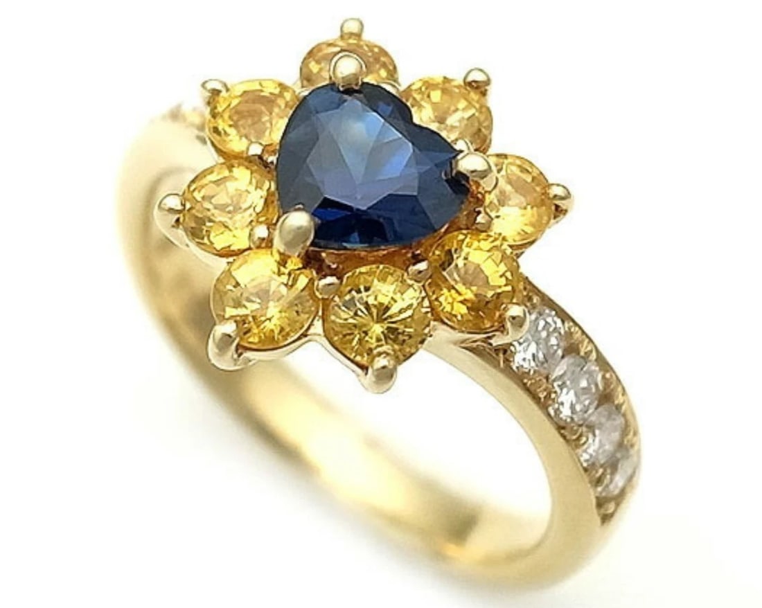MONNICKENDAM HEART BLUE SAPPHIRE YELLOW RING: Monnickendam Heart Blue Sapphire Yellow Ring Brand: Monnickendam Type: Ring Material: 18k Yellow Gold Main Stone/Creation Natural Color: Yellow Size: 6 US Accessories: None Accessories