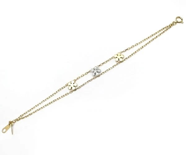 REPOSSI 18K YELLOW WHITE TWO TONE GOLD DIAMOND BANGLE: Repossi 18k Yellow White Two Tone Gold Diamond Bangle Brand: Repossi Type: Bracelet Material: 18k Yellow Gold 18k White Gold Main Stone/Creation Natural Color: Yellow, White Size: Approx. 19.0 cm