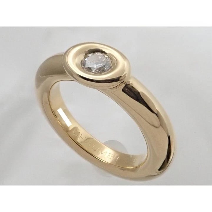 CHAUMET PARIS SOLITAIRE DIAMOND 18K YELLOW GOLD RING: Chaumet Paris Solitaire Diamond 18k Yellow Gold Ring Brand: Chaumet Type: Ring Material: 18k Yellow Gold Main Stone/Creation Natural Color: Yellow Size: 5.5 US Accessories: None Accessorie