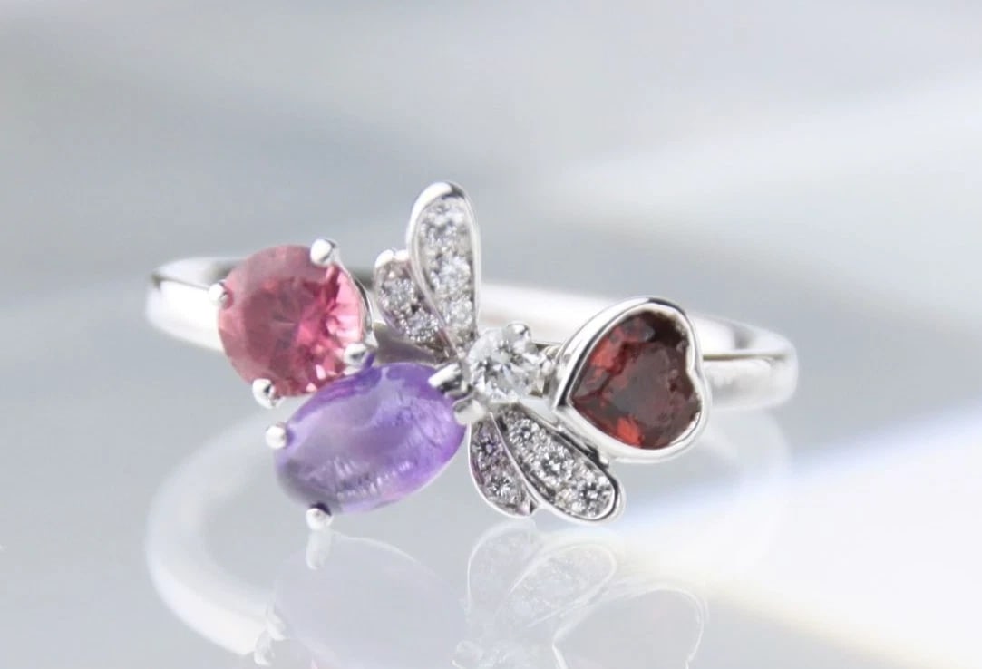 CHAUMET ATTRAPE MOI BEE HEART DIAMOND MULTI GEM RING: Chaumet Attrape Moi Bee Heart Diamond Multi Gem Ring Brand: Chaumet Type: Ring Material: 18k White Gold Main Stone/Creation Natural Color: White Size: 5.5 US Accessories: None Accessories