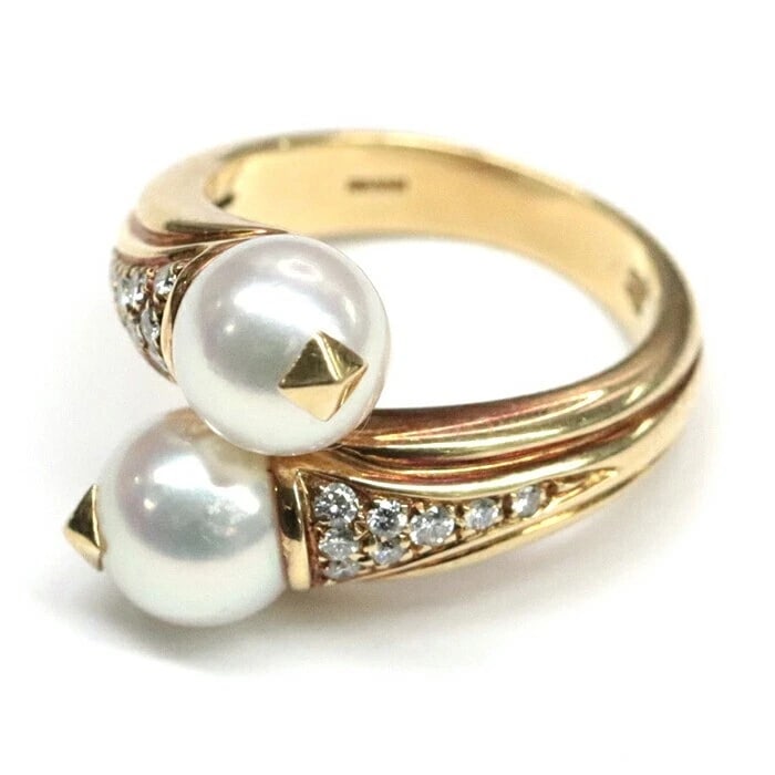 BVLGARI PASSO DOPPIO TWIN PEARLS RING: Bvlgari Passo Doppio Twin Pearls Ring Brand: Bvlgari Type: Ring Material: 18k Yellow Gold Main Stone/Creation PearlSecondary Stone Natural Color: Yellow Size: 5.5 US Accessories: None