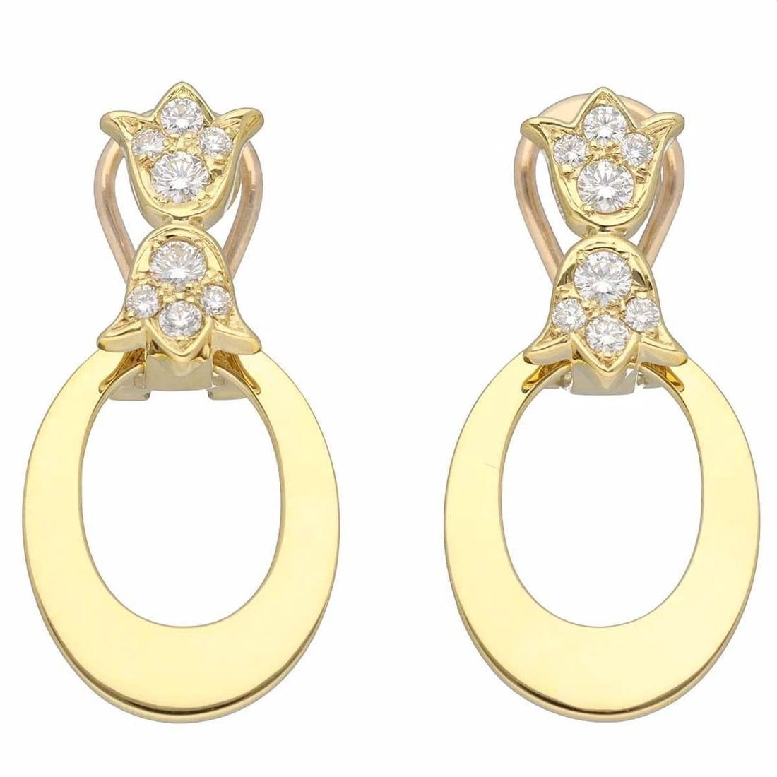 CHRISTIAN DIOR CLIP ON EARRINGS: Christian Dior Clip On Earrings Brand: Dior Type: Earrings Material: 18k Yellow Gold Main Stone/Creation Natural Color: Yellow Size: Approx. 27 × 14 mm / Approx. 1.1 × 0.6 in Accessories: None