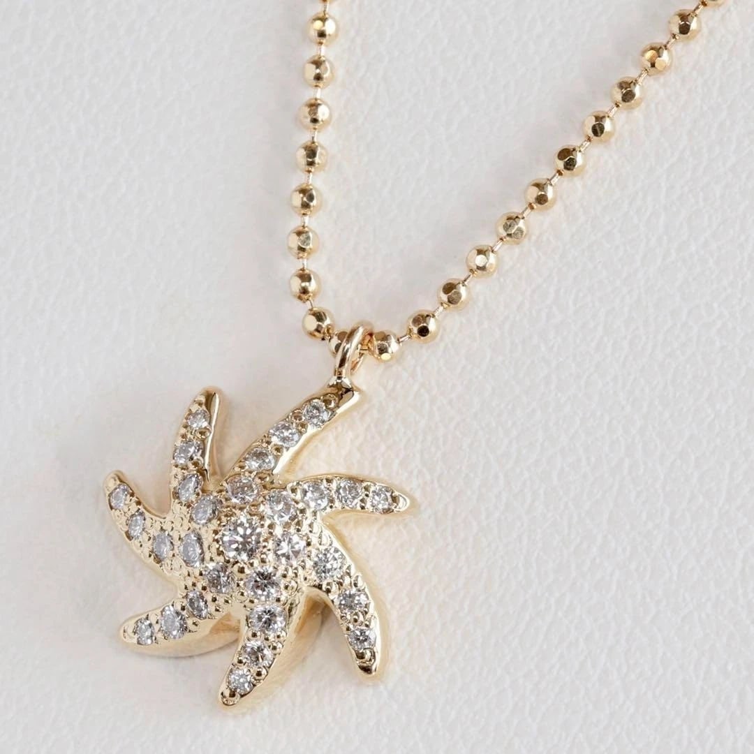 MIMI SO NY 18K YELLOW GOLD DIAMOND STARFISH CHARM PENDANT NECKLACE: Mimi So NY 18k Yellow Gold Diamond Starfish Charm Pendant Necklace Brand: Mimi So Type: Necklace Material: 18k Yellow Gold Main Stone/Creation Natural Color: Yellow Size: Pendant Size: approx.