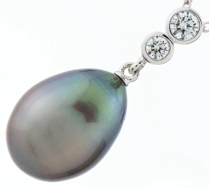 MIKIMOTO BLACK SOUTH SEA PEARL DIAMOND DROP PENDANT NECKLACE: Mikimoto Black South Sea Pearl Diamond Drop Pendant Necklace Brand: Mikimoto Type: Necklace Material: 18k White Gold Main Stone/Creation South Sea PearlSecondary Stone Natural Color: White 